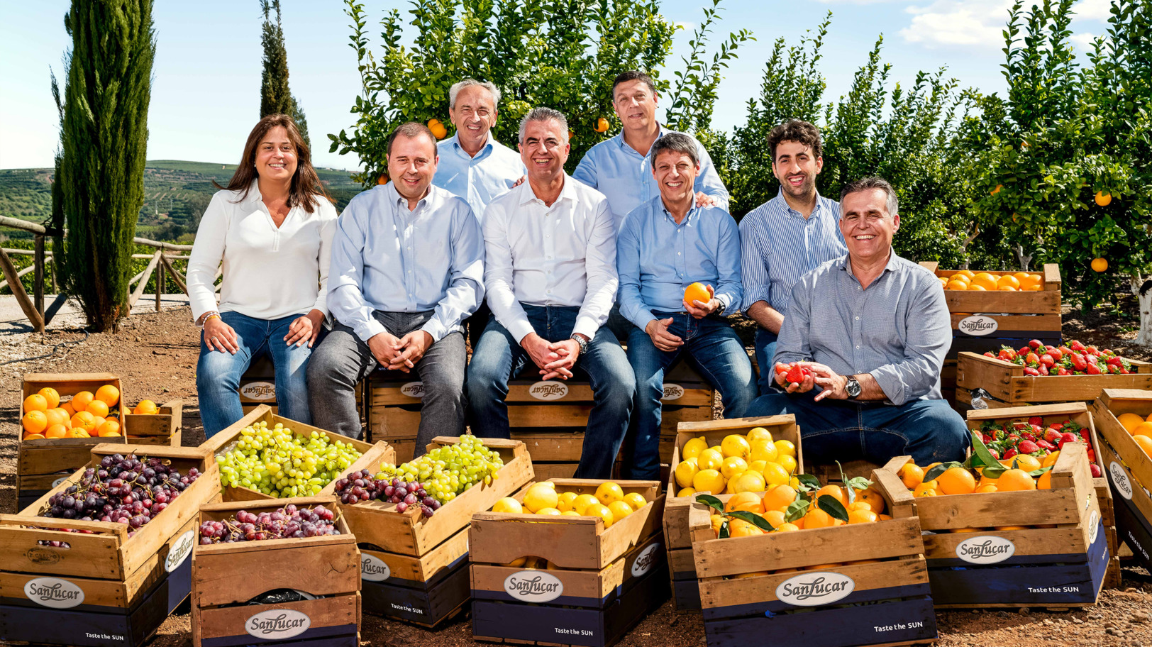 Gruppenfoto der SanLucar Meisteranbauer mit Unternehmensgründer Stephan Rötzer.