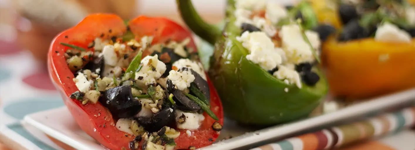 Stuffed bell peppers with cheese and olives – a flavorful and colorful appetizer or side dish