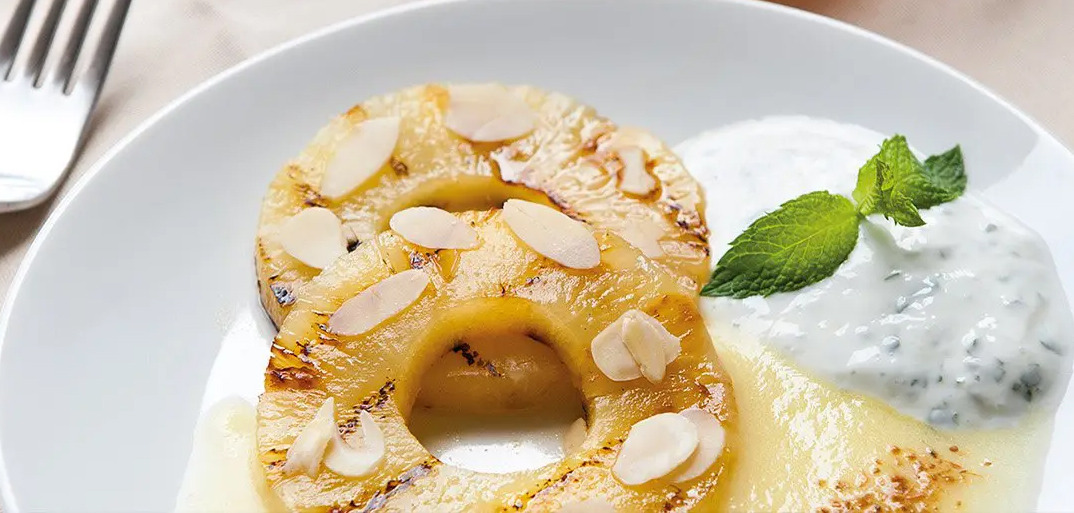 Grilled honey pineapple – a caramelized and juicy tropical dessert with a sweet honey glaze.