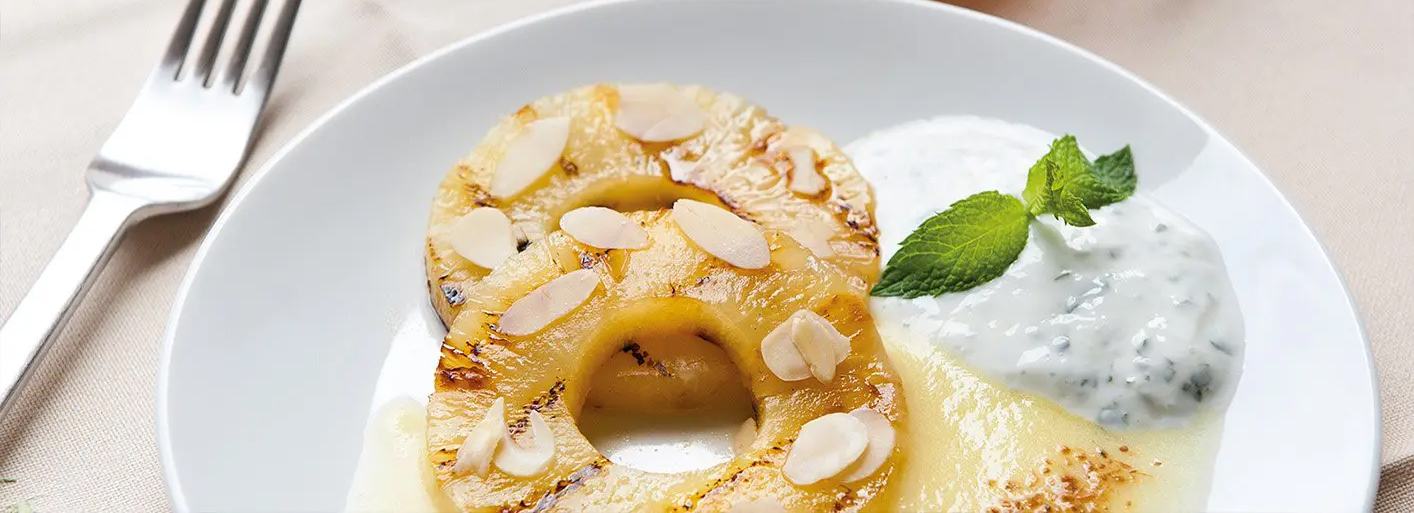 Grilled honey pineapple – a caramelized and juicy tropical dessert with a sweet honey glaze.