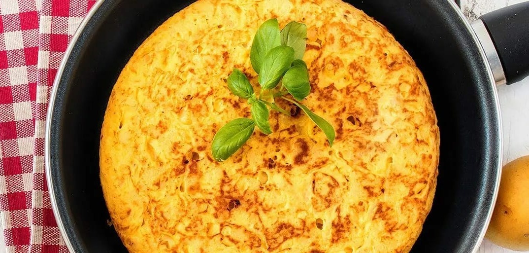 Authentic Spanish tortilla with potatoes – a classic and fluffy omelet dish, perfect for tapas or breakfast.