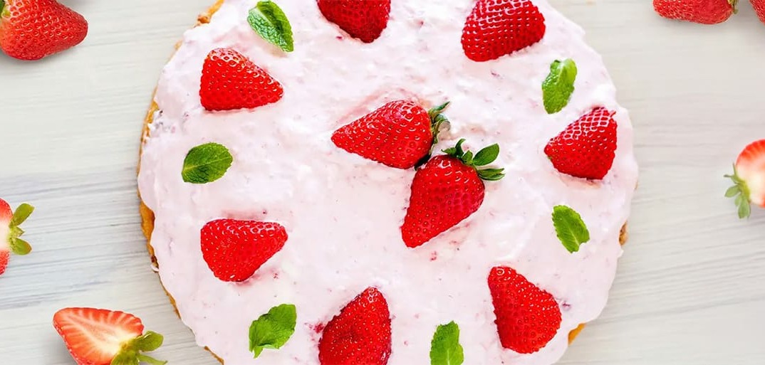 Mother’s Day strawberry cream cake – a beautifully decorated cake with fresh strawberries and whipped cream